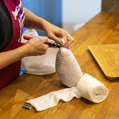 Bílá uzenářská síťka o rozměrech 12,5 cm x 5 m, s tepelnou odolností do 220°C - typ B - 5