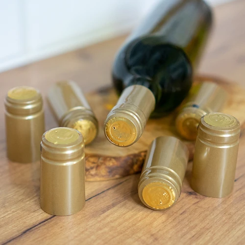 Kapsle s perforací zlaté fi 31mm 100ks. - 2